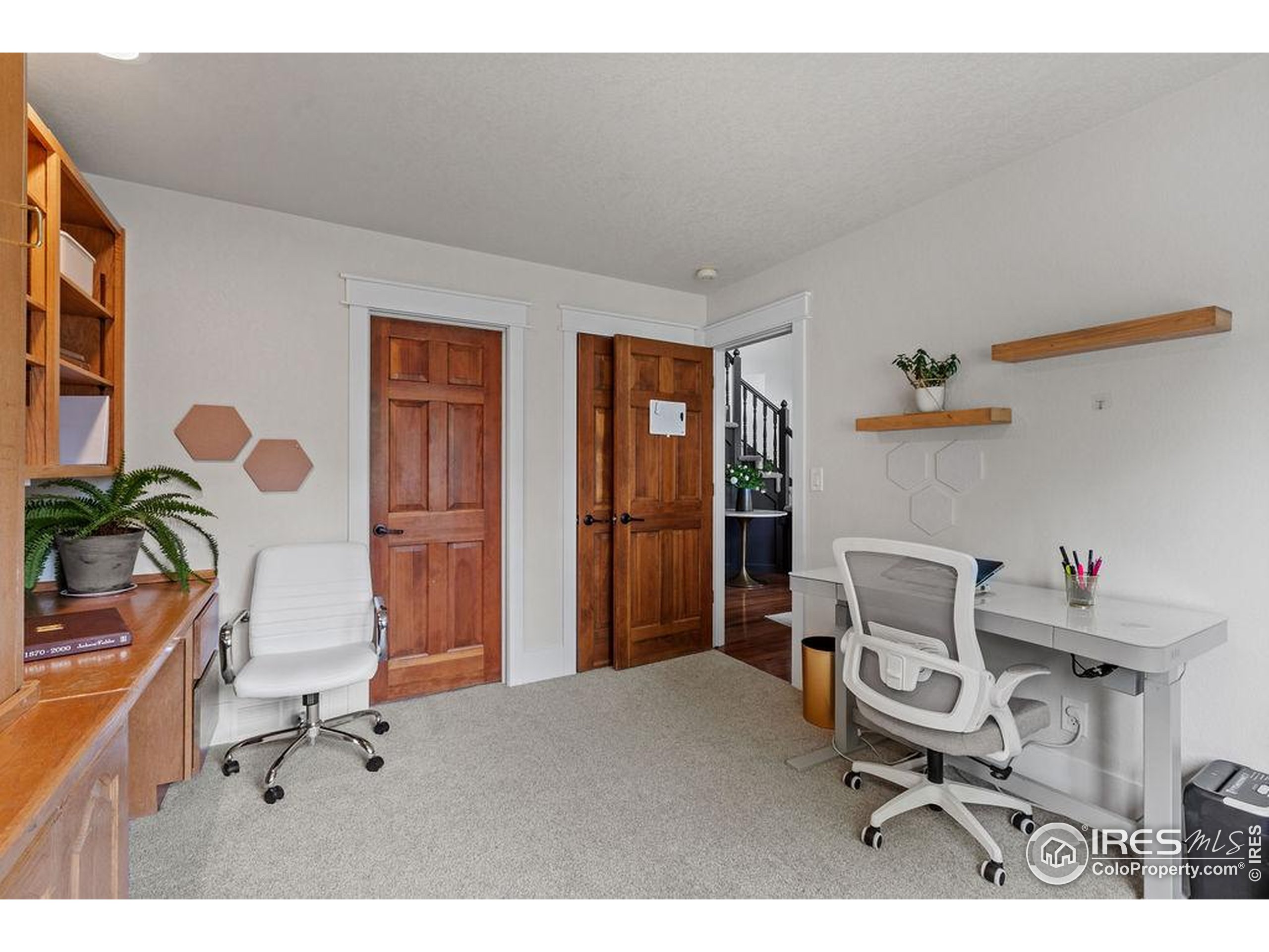2213 Grosvenor Court Fort Collins, CO 80526 - Photo 17 of 40 a living room with furniture and a potted plant