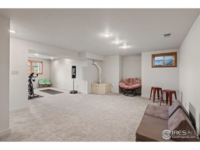 a workspace with furniture and window