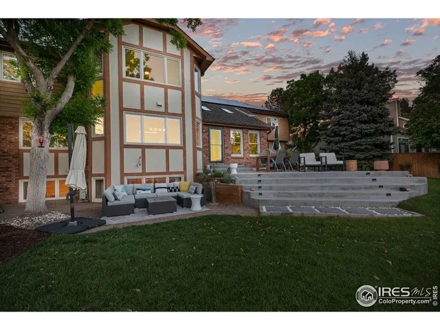 a view of a park with large trees