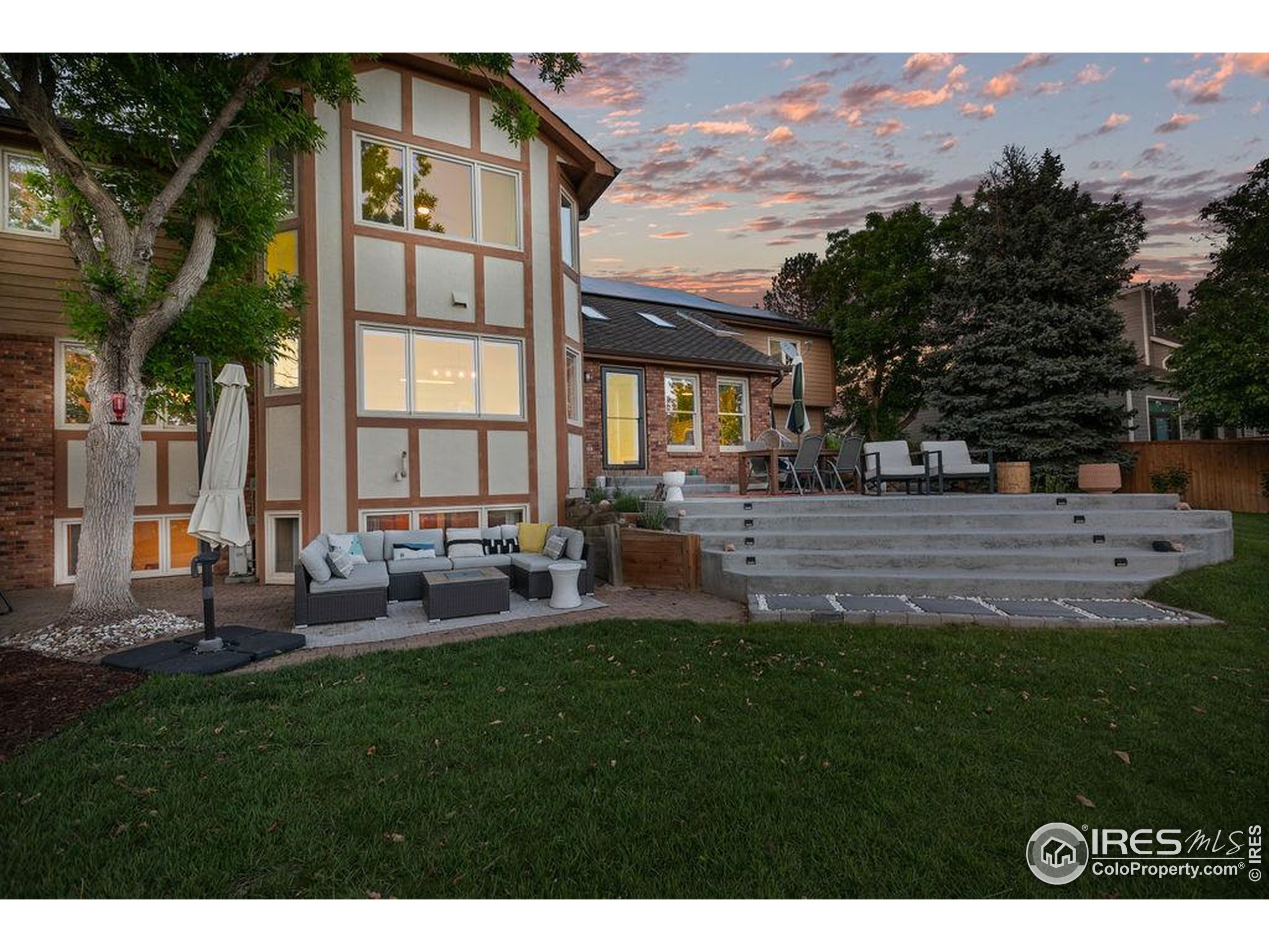 2213 Grosvenor Court Fort Collins, CO 80526 - Photo 34 of 40 a view of backyard with outdoor seating and mountain view
