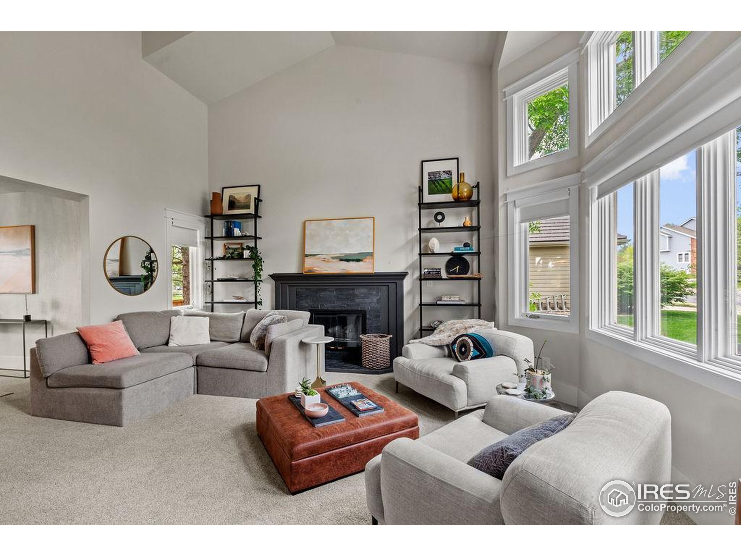 2213 Grosvenor Court Fort Collins, CO 80526 - Photo 6 of 40 a living room with fireplace furniture and a large window