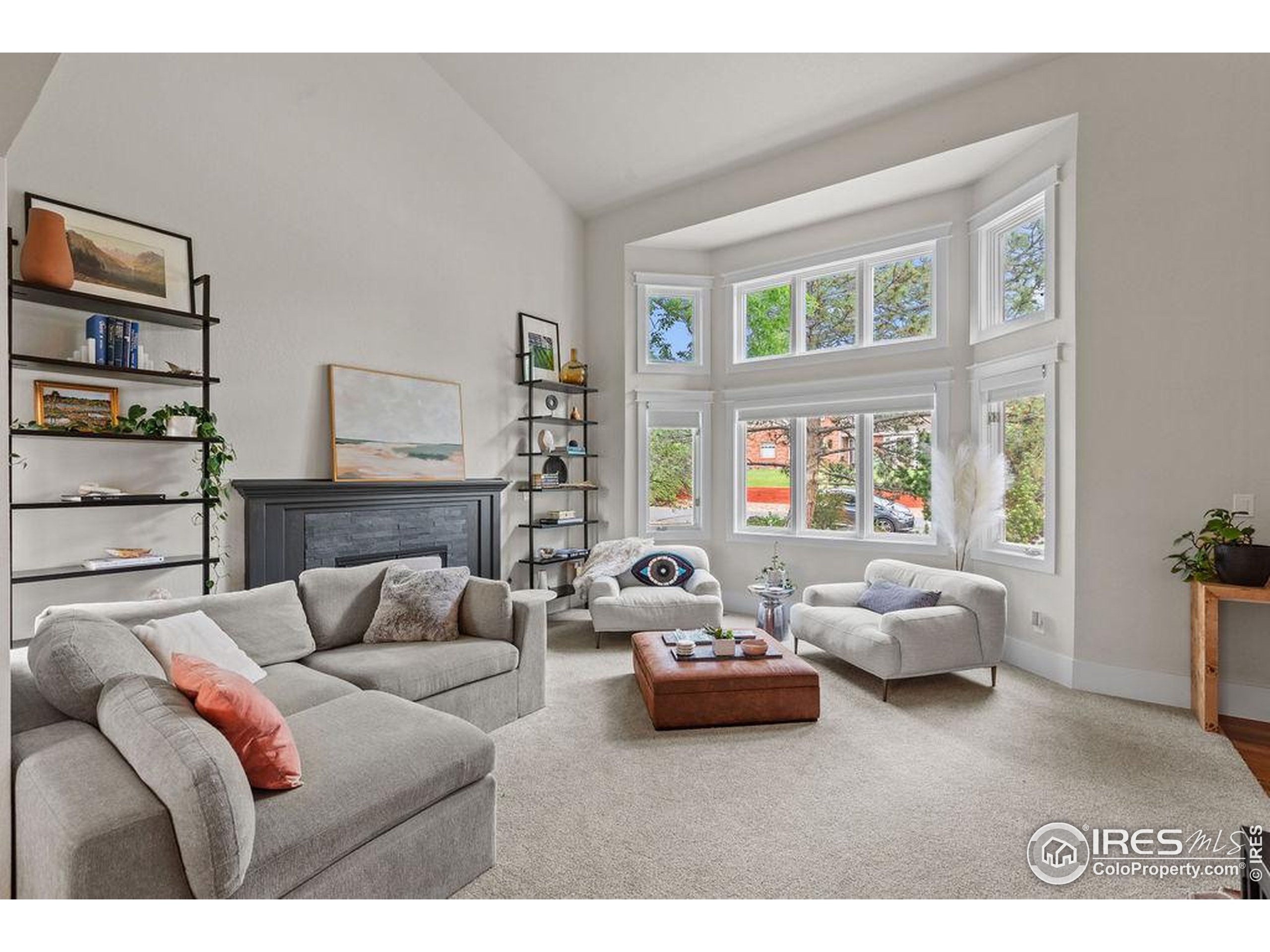 2213 Grosvenor Court Fort Collins, CO 80526 - Photo 7 of 40 a living room with furniture and a window