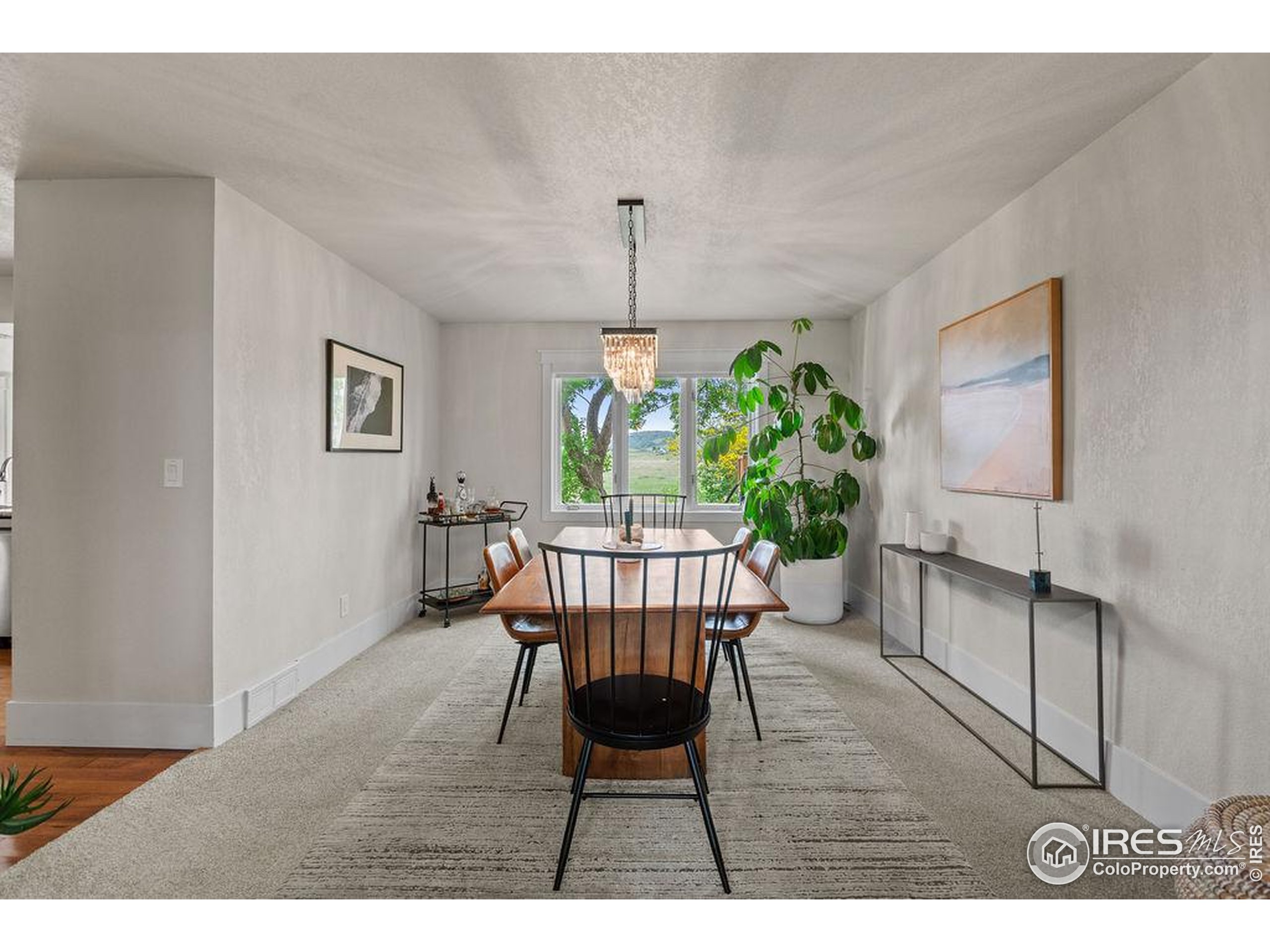 2213 Grosvenor Court Fort Collins, CO 80526 - Photo 8 of 40 a dining room with furniture and wooden floor