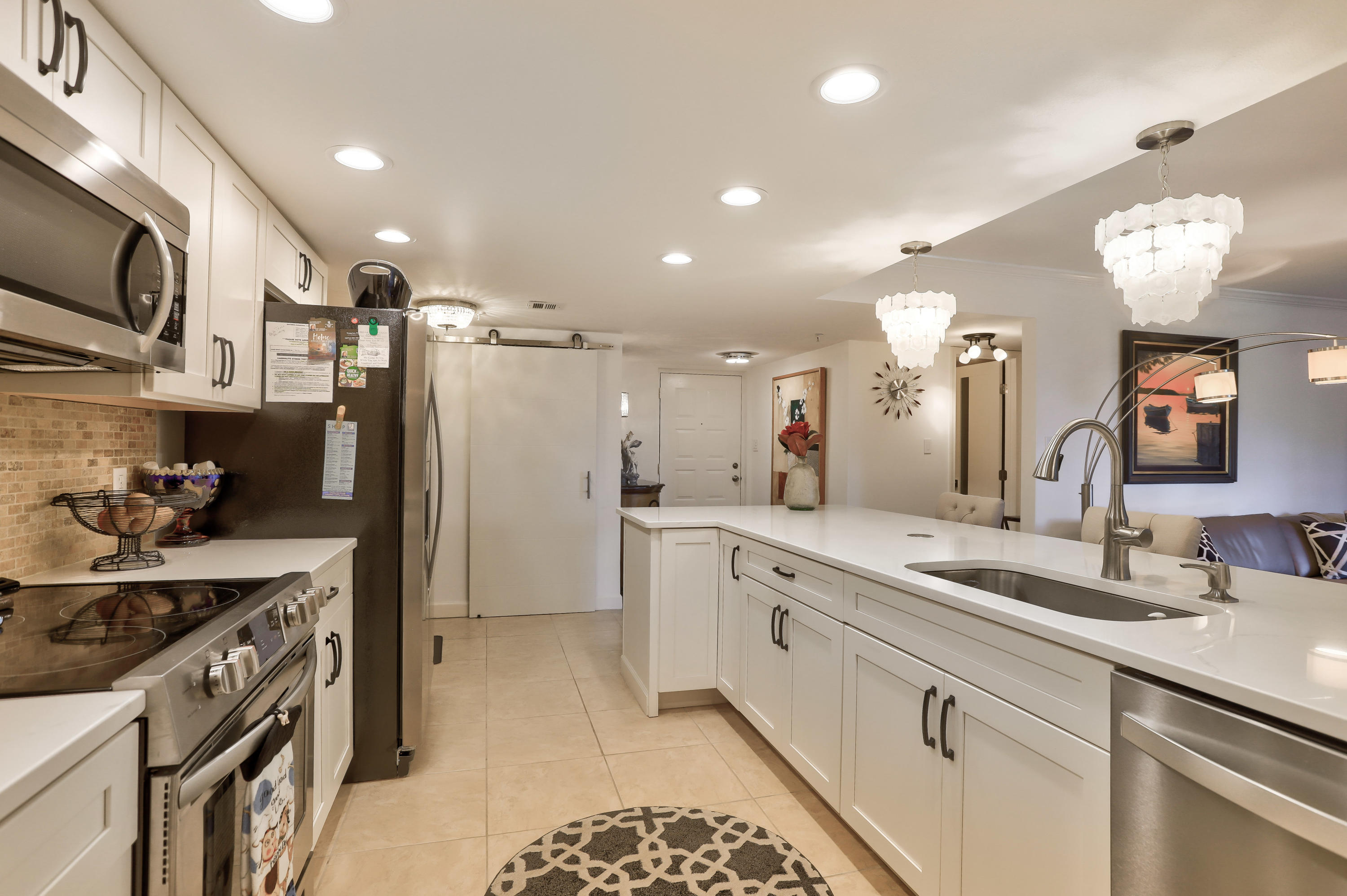 1915 Lavers Circle, Unit E109 Delray Beach, FL 33444 - Photo 4 of 22 IMG_8821_2_3_4_5