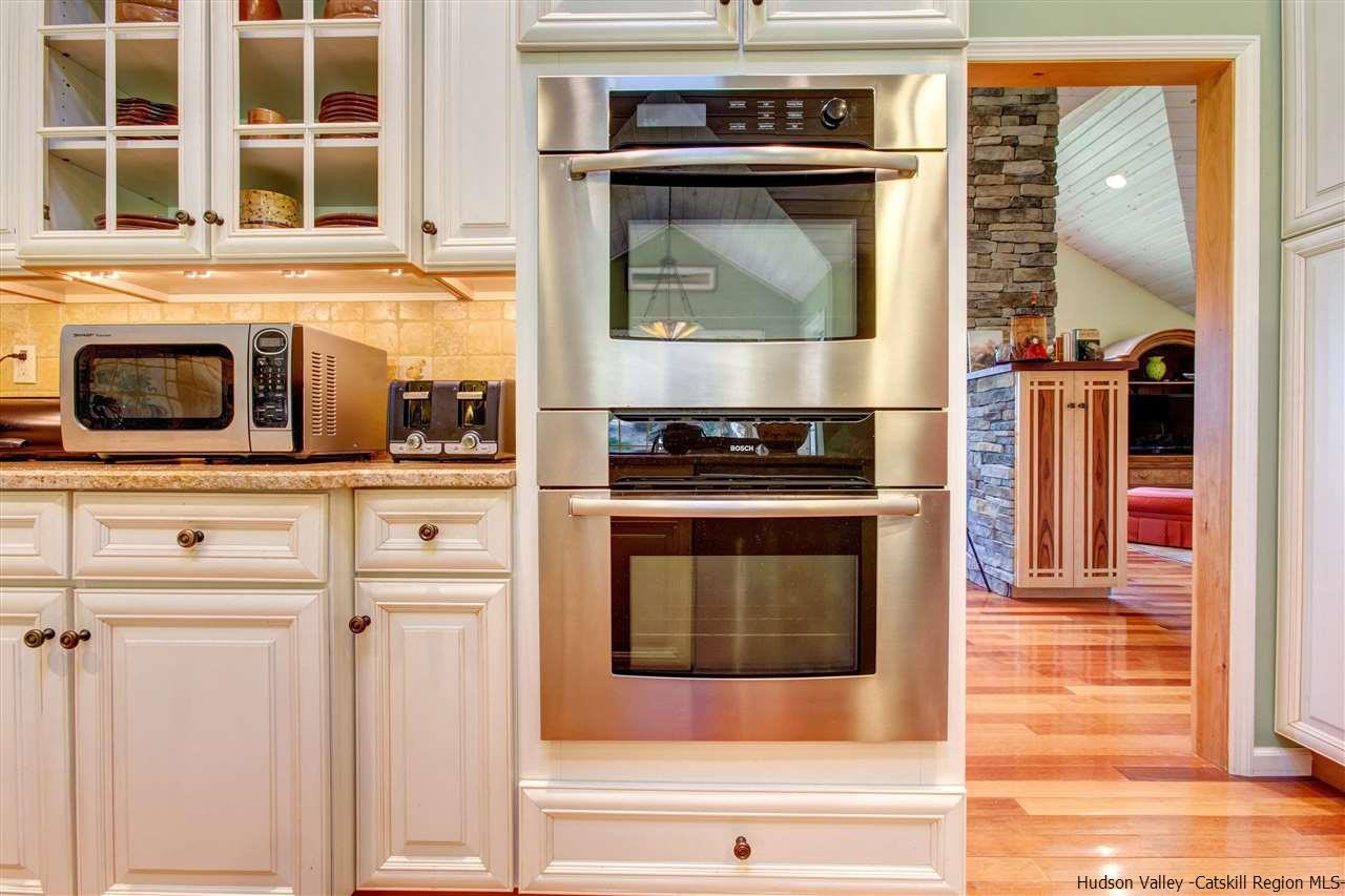 3135 Canada Hollow Road Andes, NY 13731 - Photo 15 of 33 a kitchen with a stove and a microwave