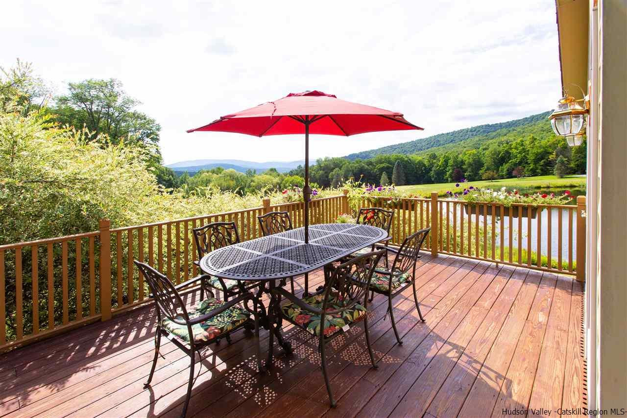 3135 Canada Hollow Road Andes, NY 13731 - Photo 25 of 33 a view of a deck with furniture and a yard