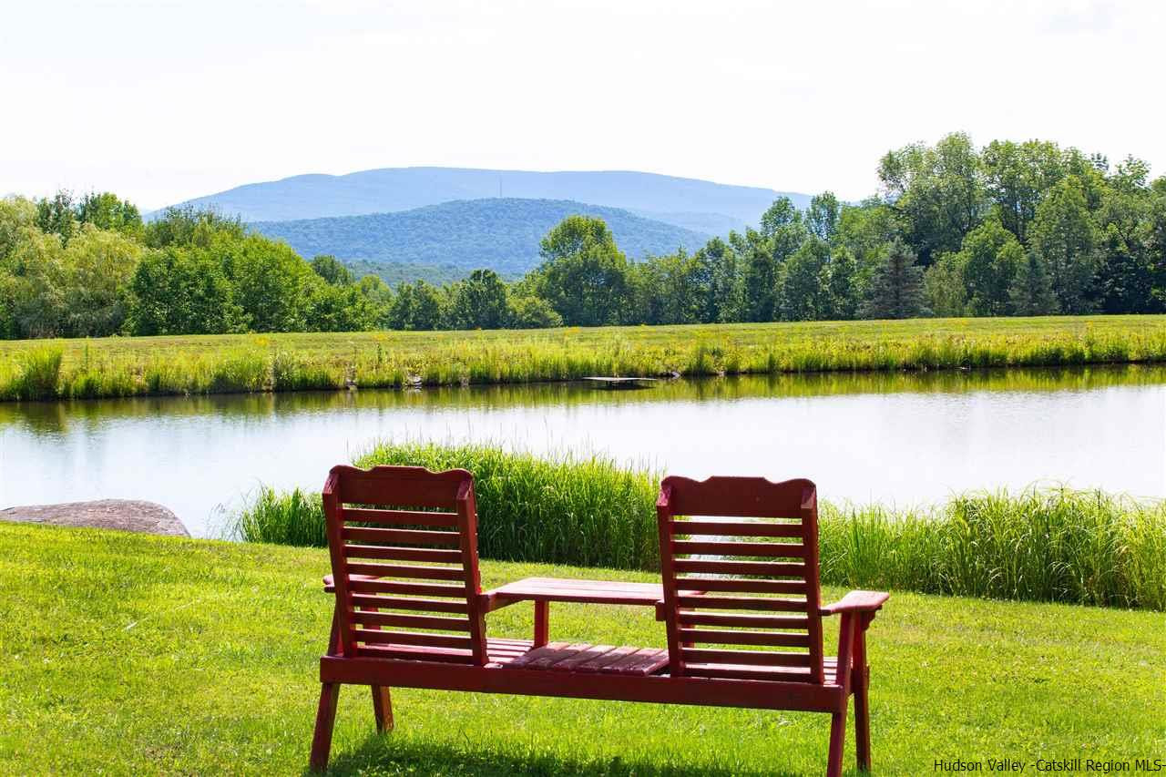 3135 Canada Hollow Road Andes, NY 13731 - Photo 26 of 33 a view of a lake with a yard next to a lake