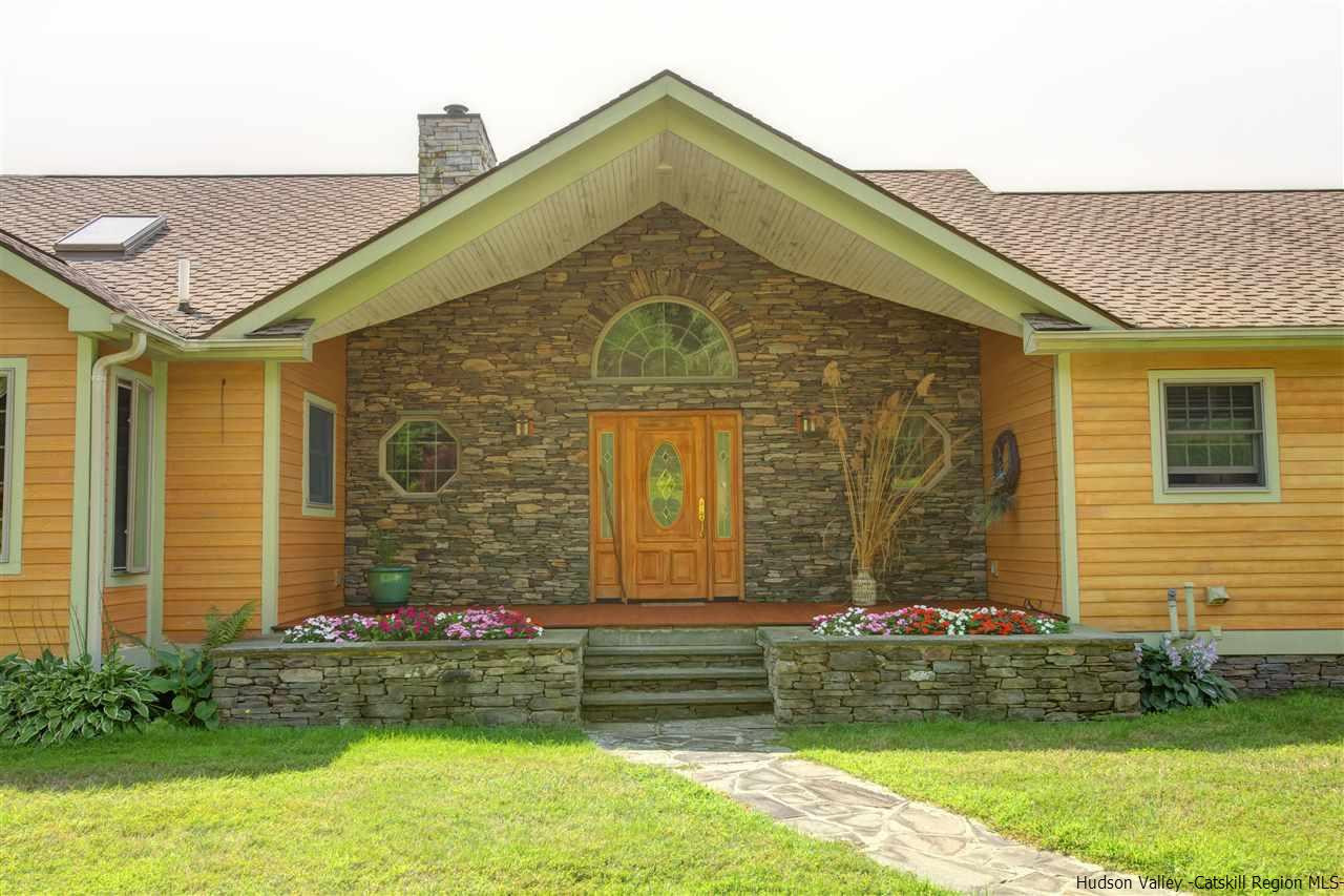 3135 Canada Hollow Road Andes, NY 13731 - Photo 5 of 33 a front view of a house with garden