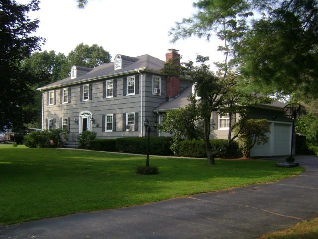 94 Gray Rock Road Trumbull, CT 06611 - Photo 1 of 1 a front view of house with yard and green space