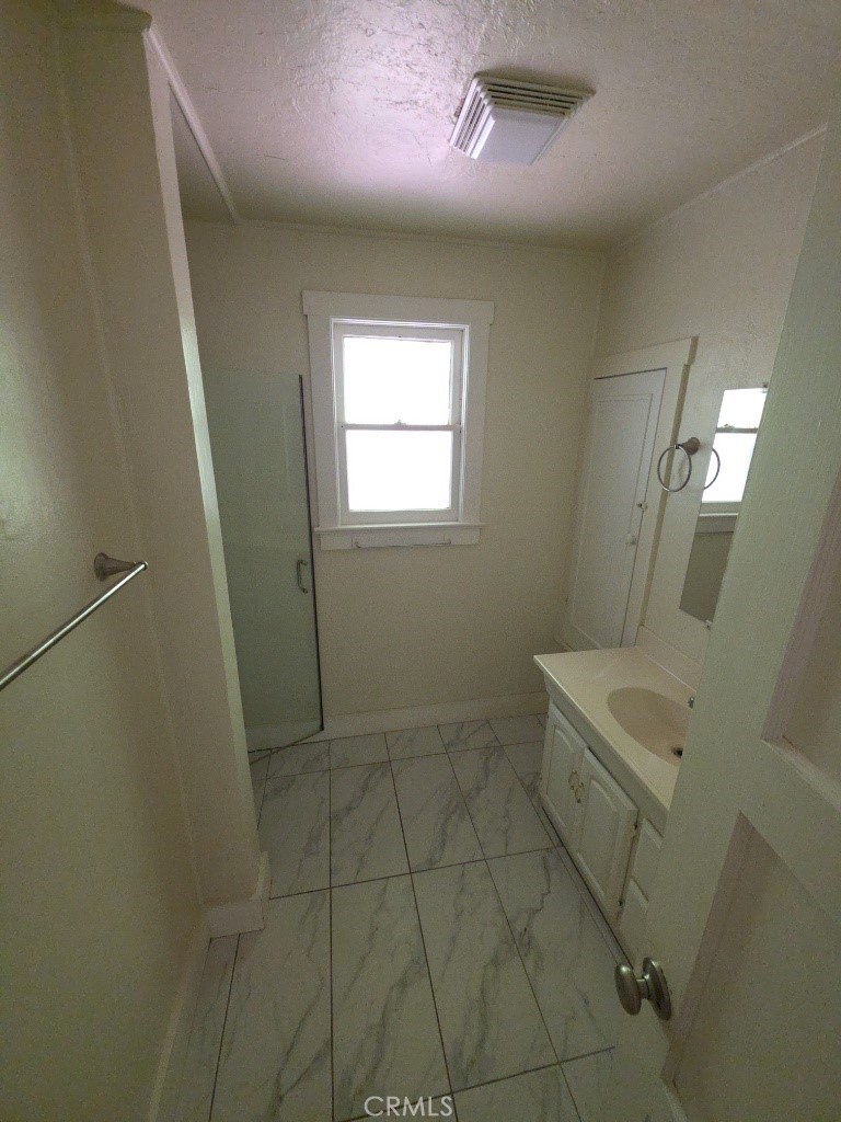 9633 Middle Creek Road Upper Lake, CA 95485 - Photo 11 of 18 a bathroom with a sink a toilet and a bathtub