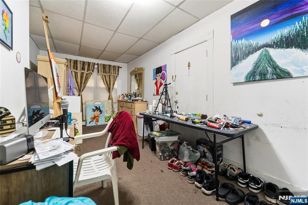 123 47th Street Union City, NJ 07087 - Photo 26 of 27 a view of a storage room with a lot of stuff and toys