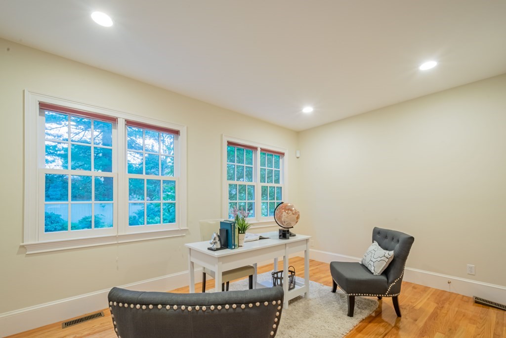 40 Winthrop Road Lexington, MA 02421 - Photo 20 of 42 a living room with furniture and a window