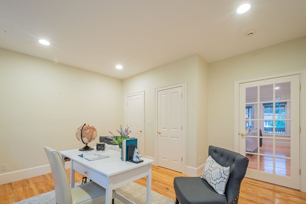 40 Winthrop Road Lexington, MA 02421 - Photo 21 of 42 a living room with furniture and a table