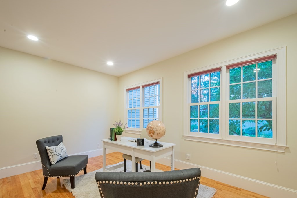 40 Winthrop Road Lexington, MA 02421 - Photo 22 of 42 a living room with furniture and a window