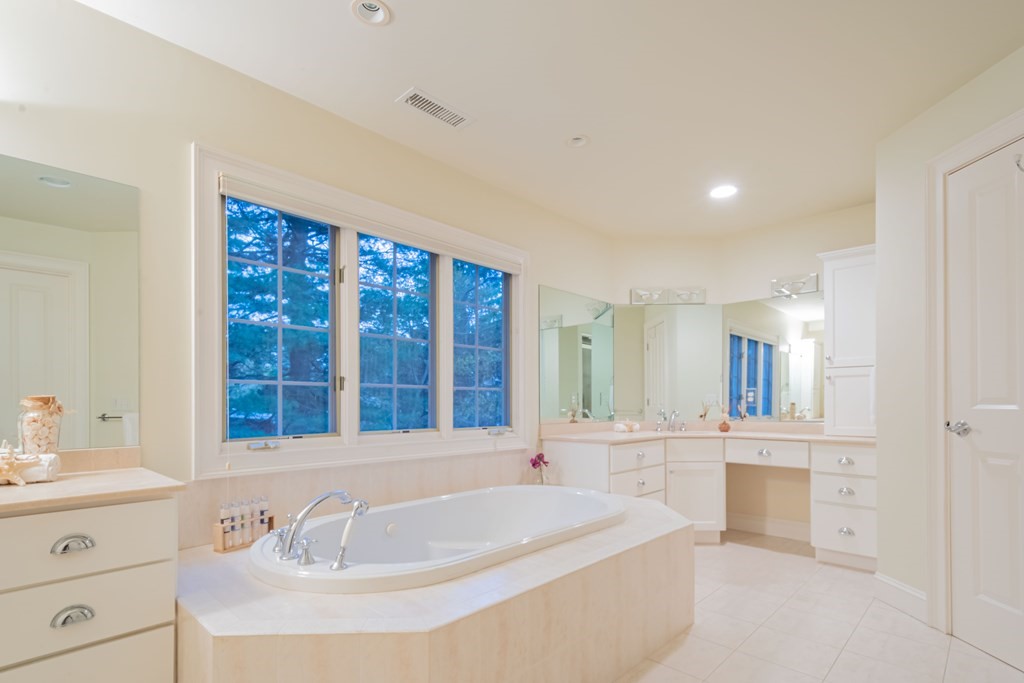 40 Winthrop Road Lexington, MA 02421 - Photo 29 of 42 a bathroom with a sink double vanity and a mirror