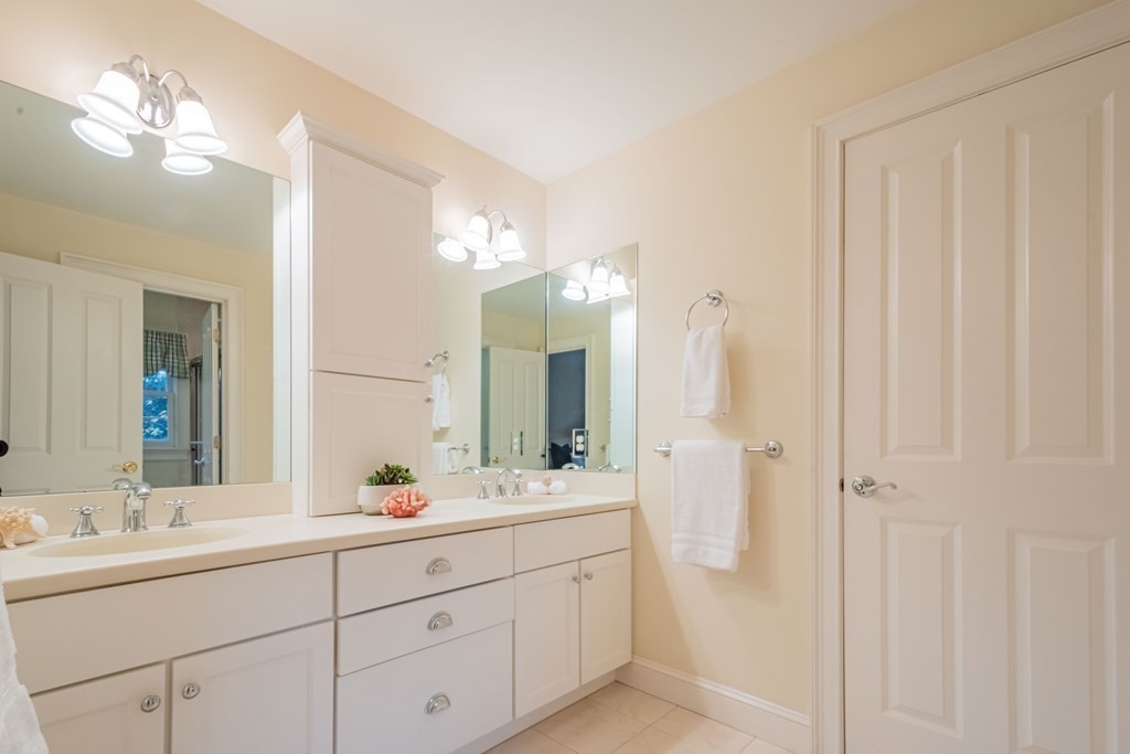 40 Winthrop Road Lexington, MA 02421 - Photo 34 of 42 a bathroom with a double vanity sink mirror and double