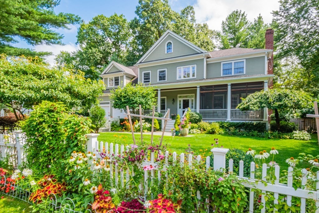 40 Winthrop Road Lexington, MA 02421 - Photo 40 of 42 a front view of the house with a yard and potted plants
