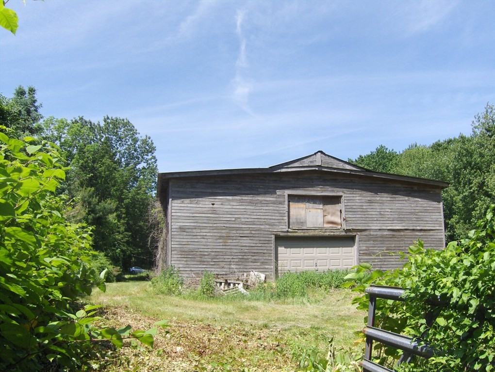 0 Little Rest Road Warren, MA 01083 - Photo 4 of 15 a front view of a house with a yard