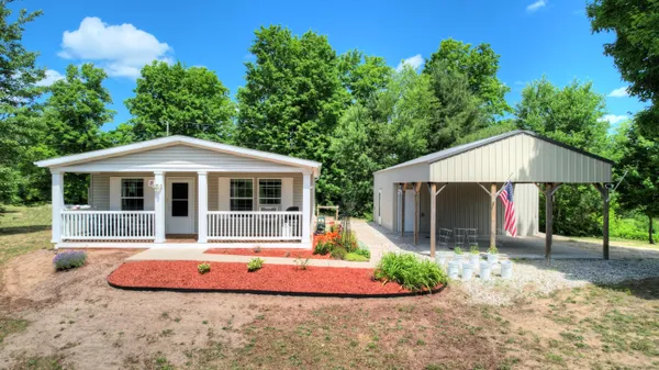 $272,000 | 3921 Woodman Road, South Boardman, MI 49680