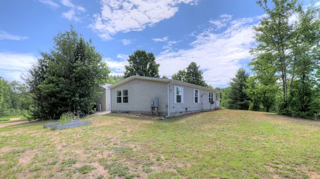 $264,900 | 3921 Woodman Road, South Boardman, MI 49680