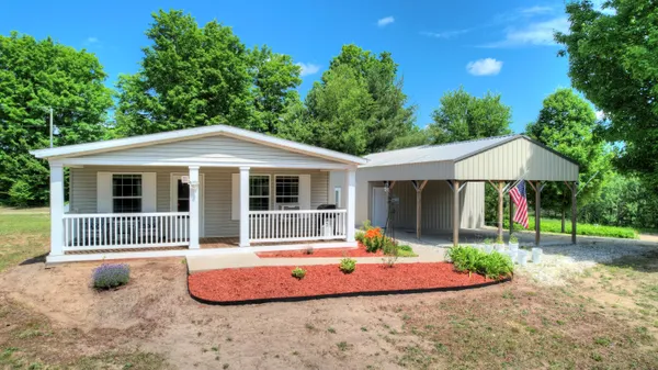 $272,000 | 3921 Woodman Road, South Boardman, MI 49680