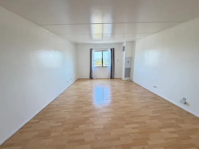 an empty room with a natural light