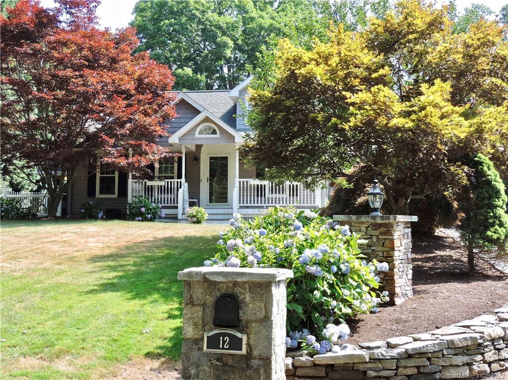 12 Mott Hill Road East Hampton, CT 06424 - Photo 1 of 1 a front view of a house with garden