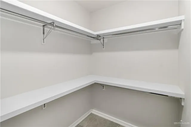 a view of a room with racks on the wall