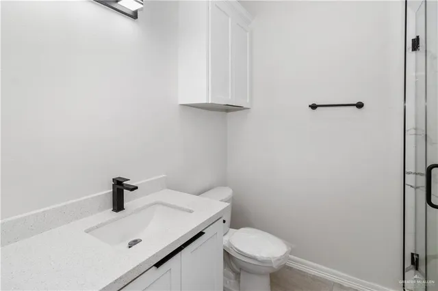 a bathroom with a sink and a toilet
