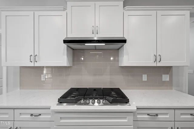 a view of a small space with racks on the wall