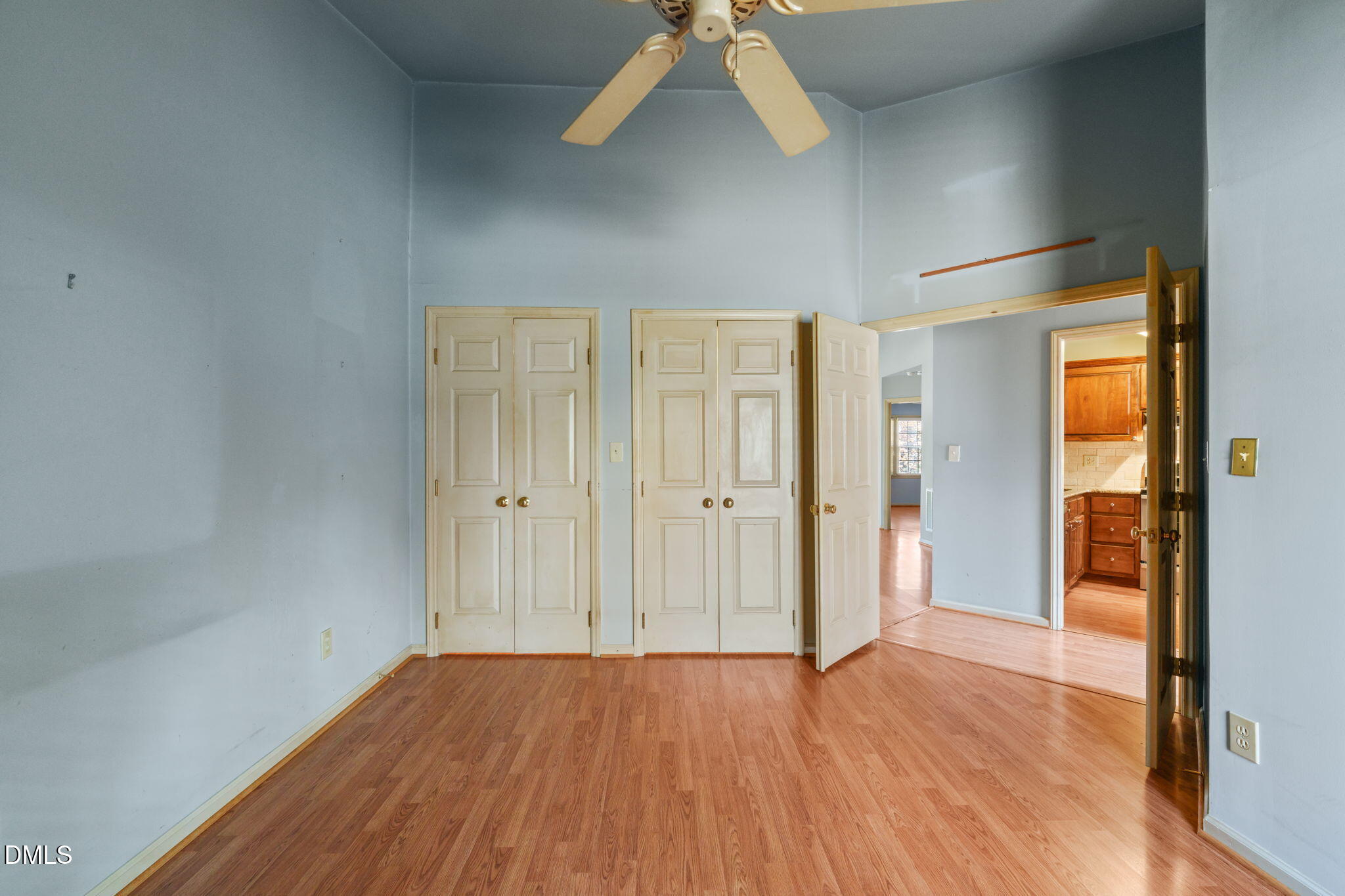 1212 Berley Court Raleigh, NC 27609 - Photo 27 of 38 an empty room with wooden floor and windows