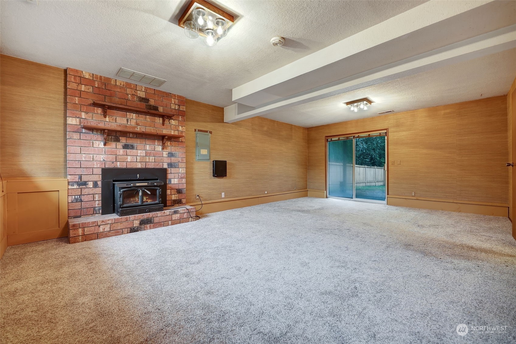 17206 30th Drive Southeast Bothell, WA 98012 - Photo 17 of 40 a view of a livingroom with an empty space and a fireplace