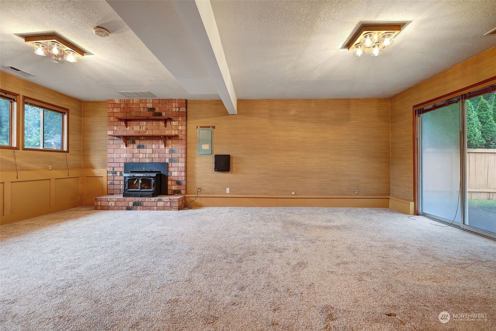 17206 30th Drive Southeast Bothell, WA 98012 - Photo 18 of 40 a view of an empty room with a fireplace