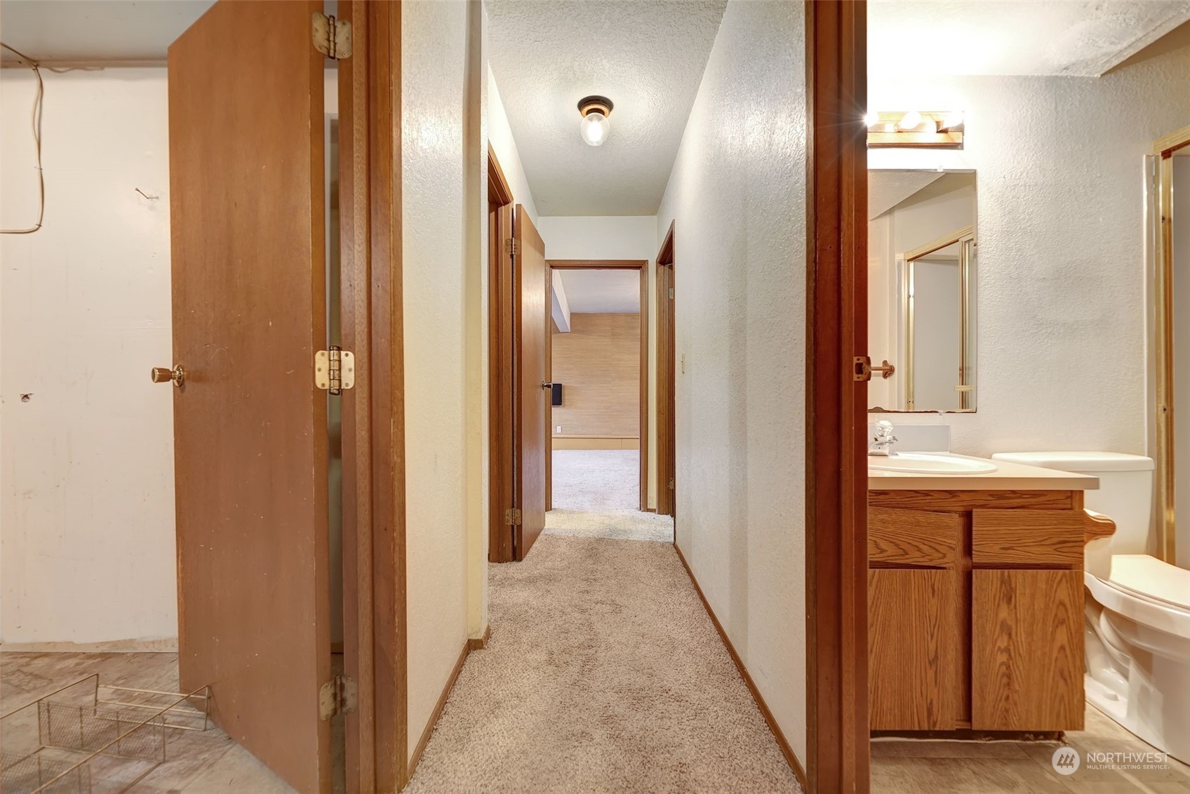 17206 30th Drive Southeast Bothell, WA 98012 - Photo 21 of 40 a view of a bathroom from the hallway