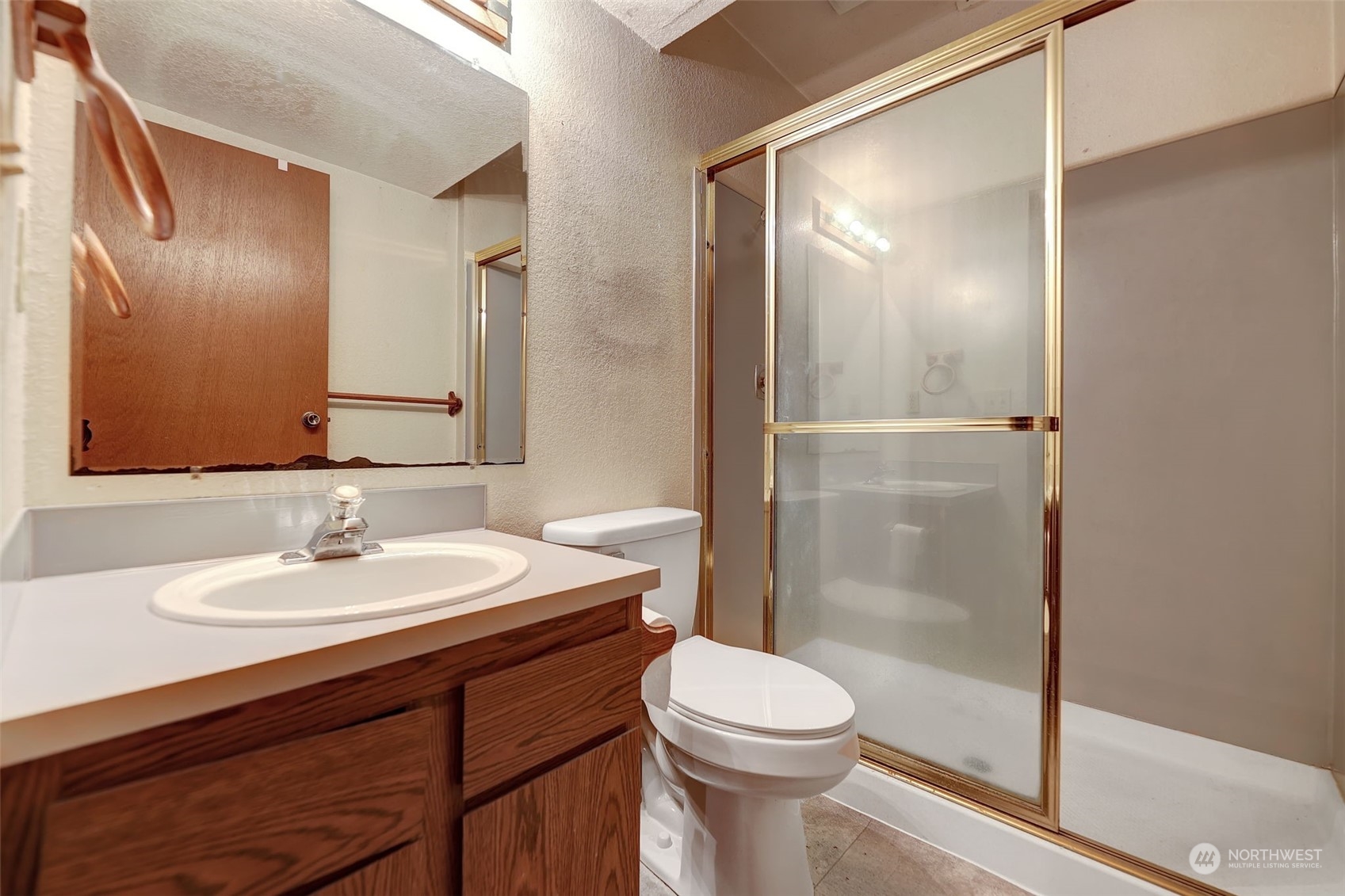 17206 30th Drive Southeast Bothell, WA 98012 - Photo 22 of 40 a bathroom with a sink and a mirror