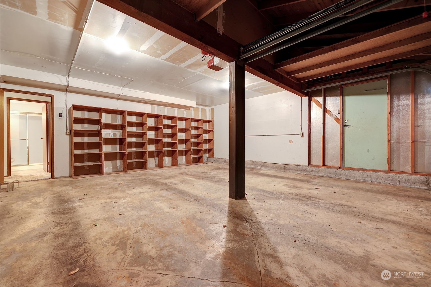 17206 30th Drive Southeast Bothell, WA 98012 - Photo 25 of 40 a view of a room with wooden floor and windows