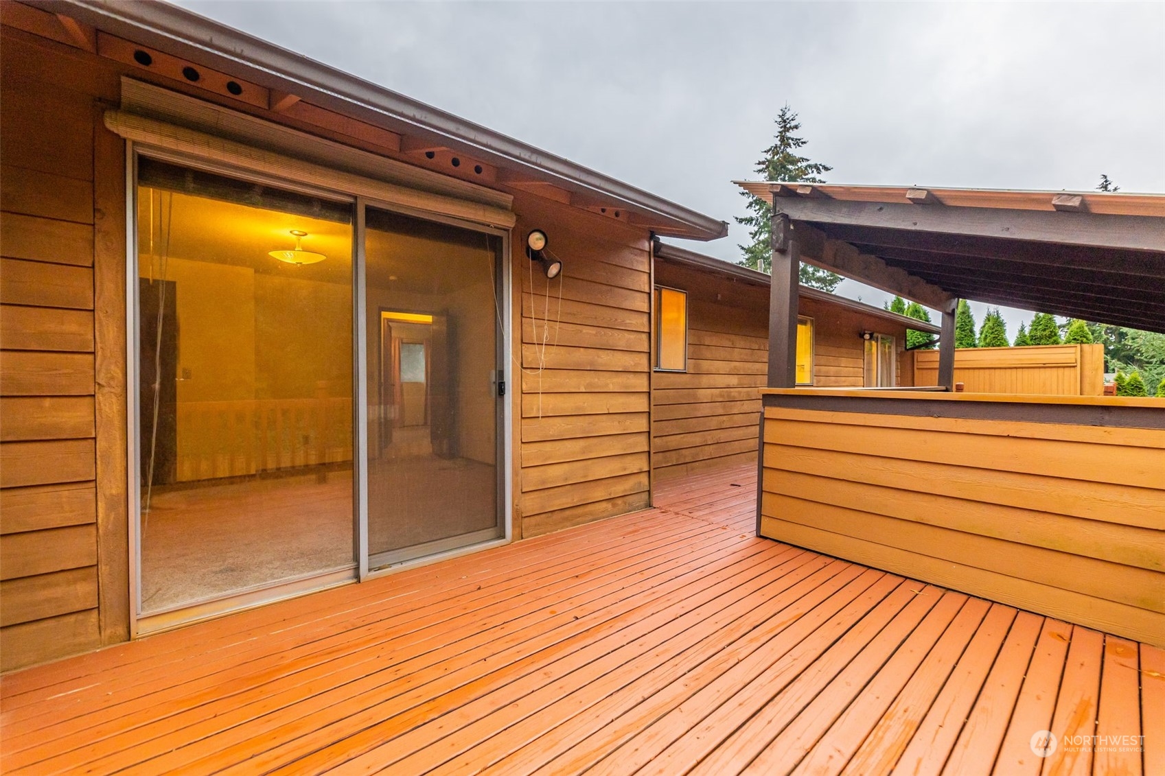 17206 30th Drive Southeast Bothell, WA 98012 - Photo 30 of 40 a view of a balcony with door and wooden floor
