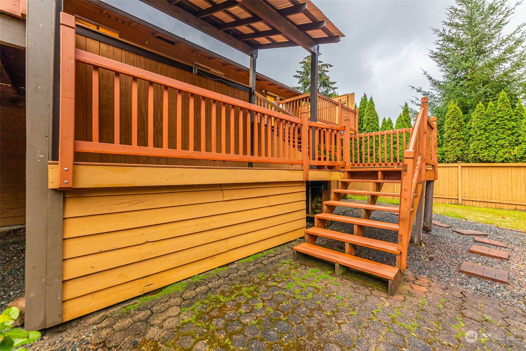 17206 30th Drive Southeast Bothell, WA 98012 - Photo 32 of 40 a view of a backyard with stairs and a fence