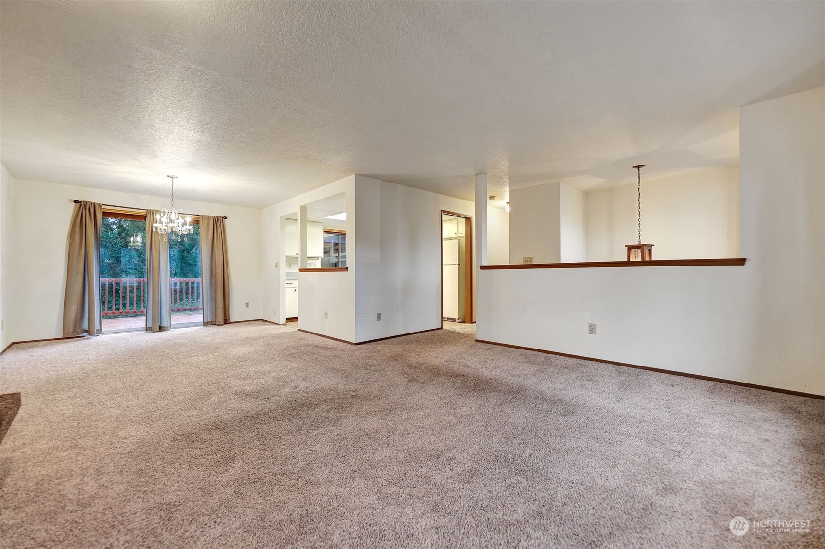 17206 30th Drive Southeast Bothell, WA 98012 - Photo 4 of 40 a view of an empty room with a window
