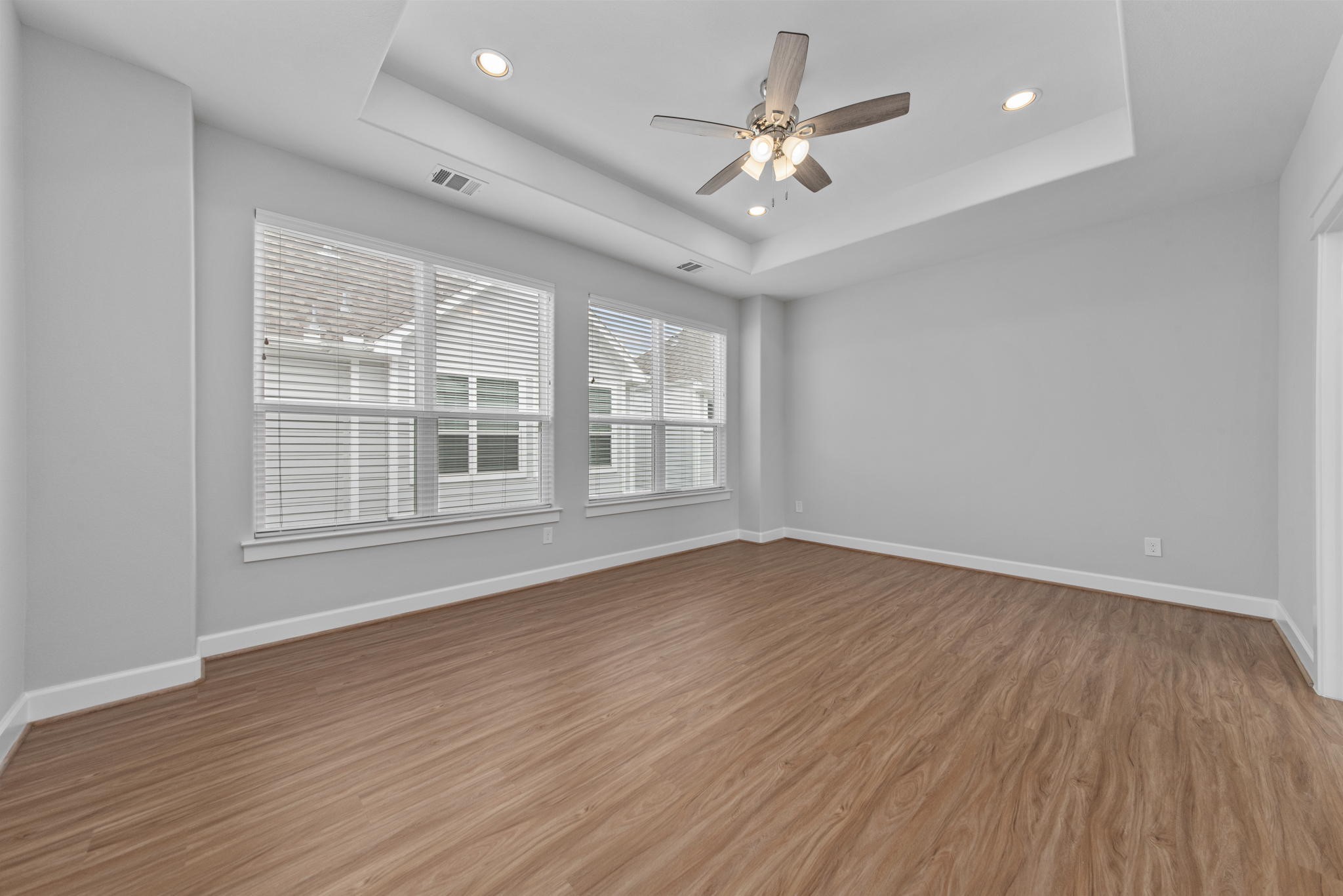 623 Link Road Houston, TX 77009 - Photo 11 of 25 a view of an empty room with wooden floor and a window