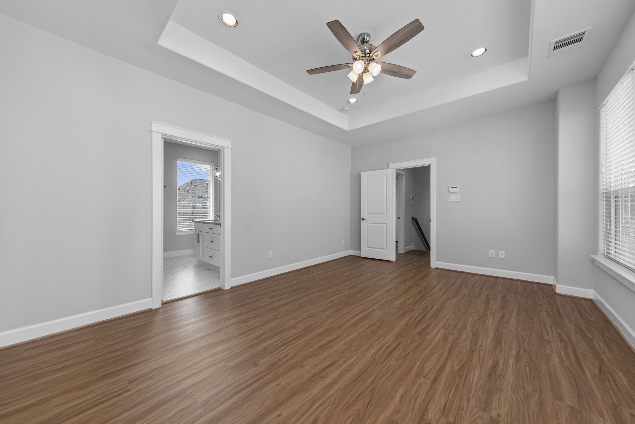 623 Link Road Houston, TX 77009 - Photo 14 of 25 a view of an empty room with wooden floor and a window