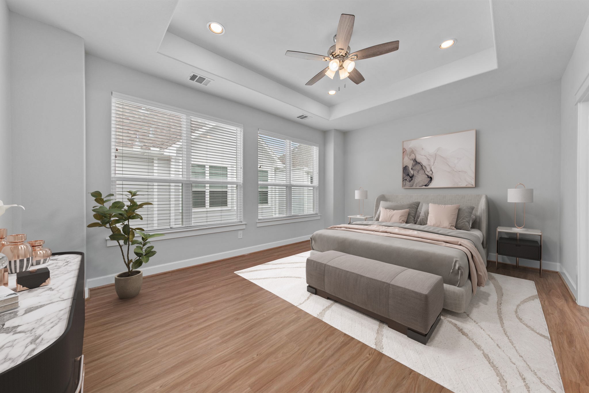 623 Link Road Houston, TX 77009 - Photo 10 of 25 a spacious bedroom with a large bed a chandelier and windows