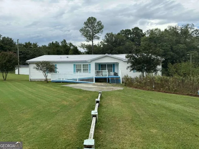 a view of a house with a swimming pool