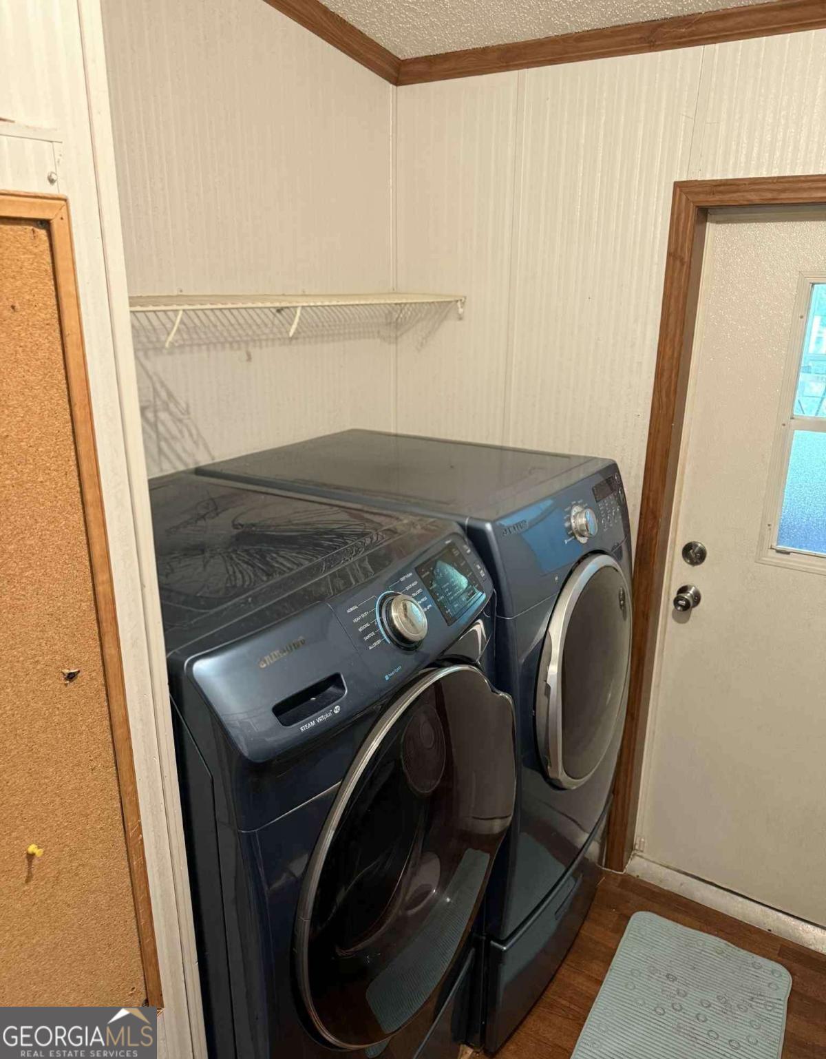 289 Mason Dixon Line Road, Unit 3 Ashburn, GA 31714 - Photo 26 of 32 a utility room with dryer and washer