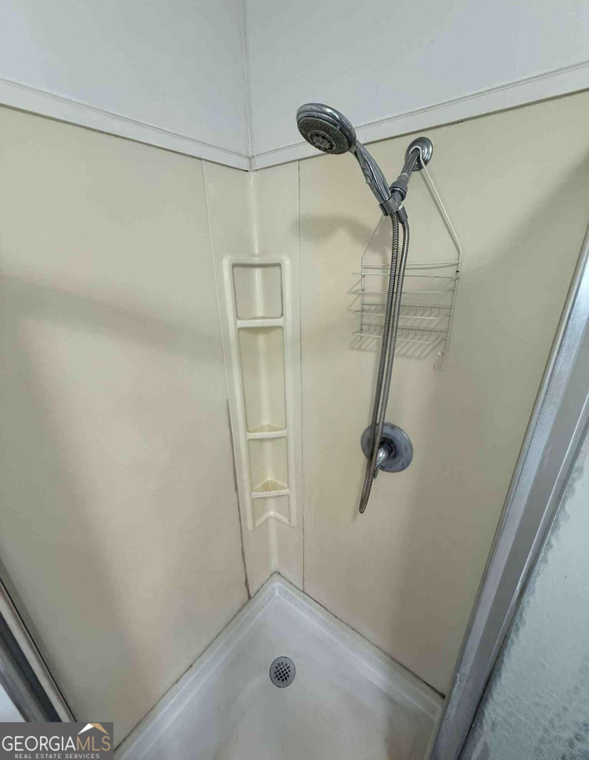 289 Mason Dixon Line Road, Unit 3 Ashburn, GA 31714 - Photo 28 of 32 a bathroom with a shower