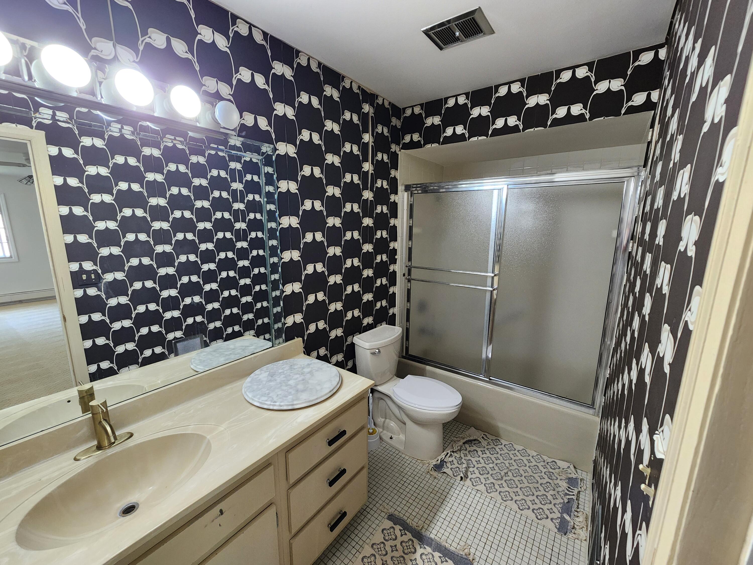 1730 West Green Tree Road, Unit 305 Glendale, WI 53209 - Photo 9 of 37 Primary Bedroom Bathroom