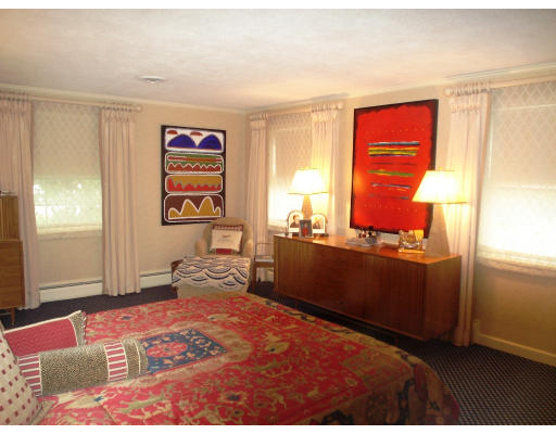 141 Worthen Road Lexington, MA 02421 - Photo 12 of 21 a bedroom with a bed and a window