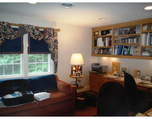 141 Worthen Road Lexington, MA 02421 - Photo 15 of 21 a living room with furniture and a window