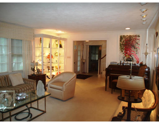 141 Worthen Road Lexington, MA 02421 - Photo 3 of 21 a living room with furniture and a large window