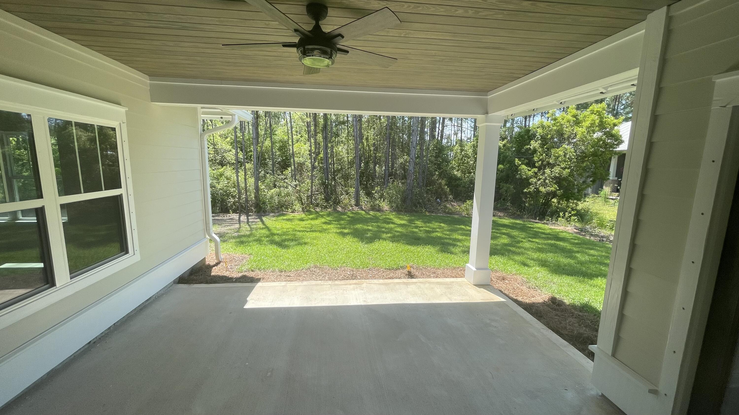 116 Bear Creek Boulevard Freeport, FL 32439 - Photo 16 of 16 a view of backyard with green space